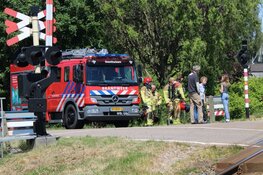 Brand langs spoorlijn in Oosthuizen